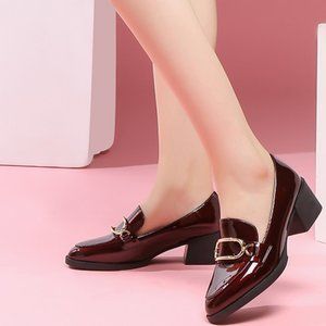 A pair of thick sole shoes